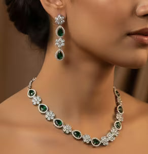 Green stone diamond finish necklace set with matching earrings for women.