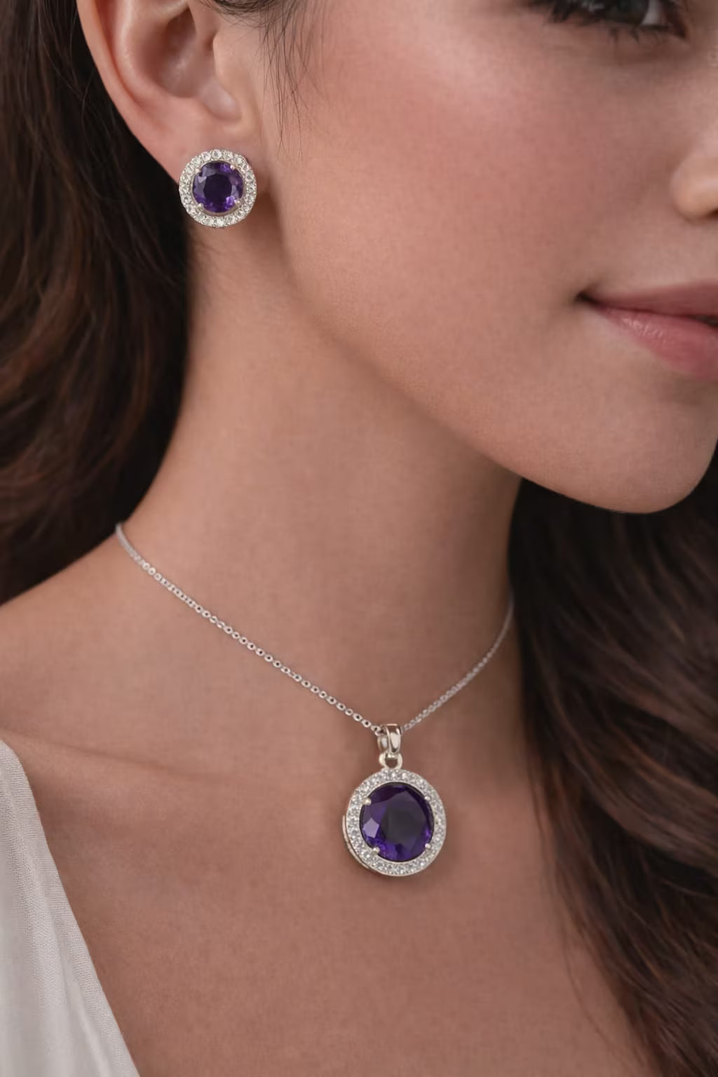 Purple oval diamond silver pendant set worn by model