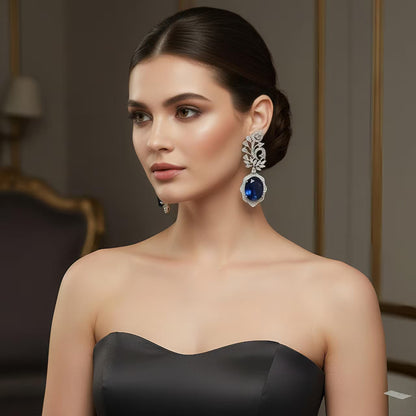 Blue Sapphire Diamond Drop Earrings wearing a model