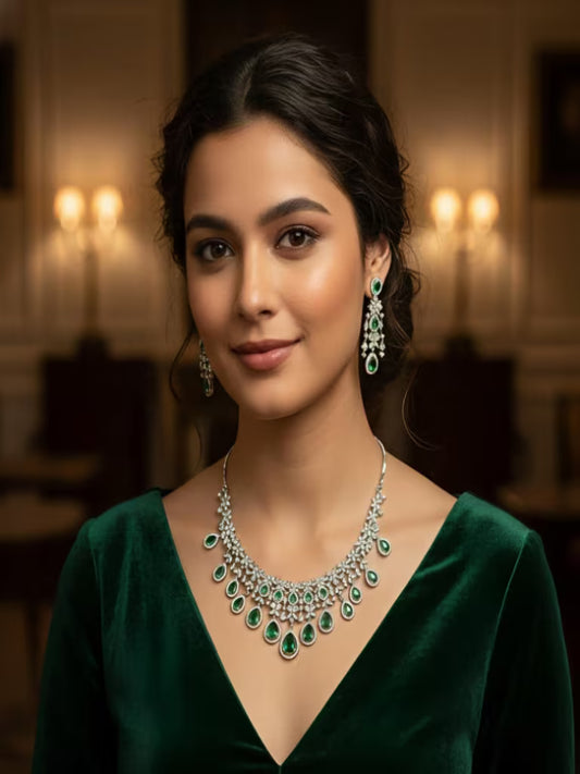 Emerald drop silver necklace set with zircon stones and matching earrings by Karat Indiaa