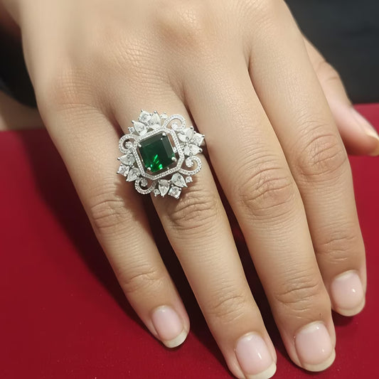  Emerald green rectangular stone silver ring with white zircon floral halo design