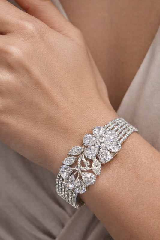 Floral diamond look silver plated bracelet close up design
