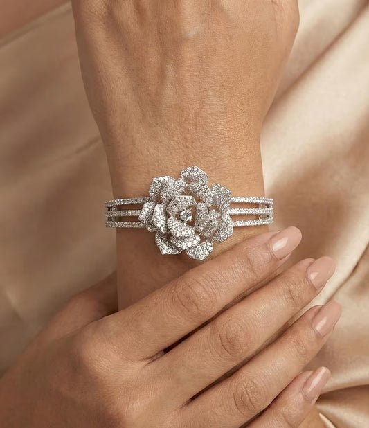 Floral rose design diamond look bracelet with silver finish