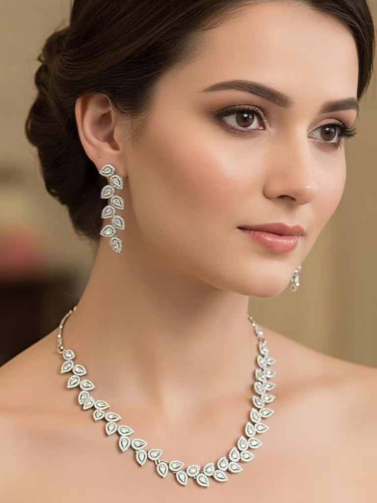 Elegant leaf design white diamond necklace set for wedding and party wear by Karat India.
