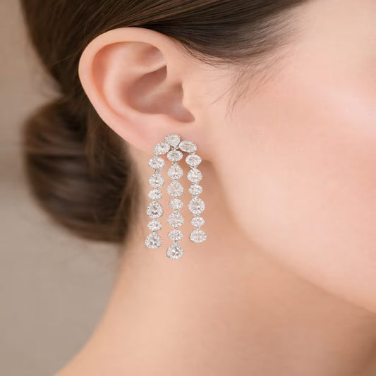 Long drop silver earrings with pear-shaped stones for women