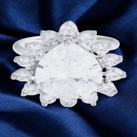 Pear cut clear crystal silver statement ring with white zircon floral halo design