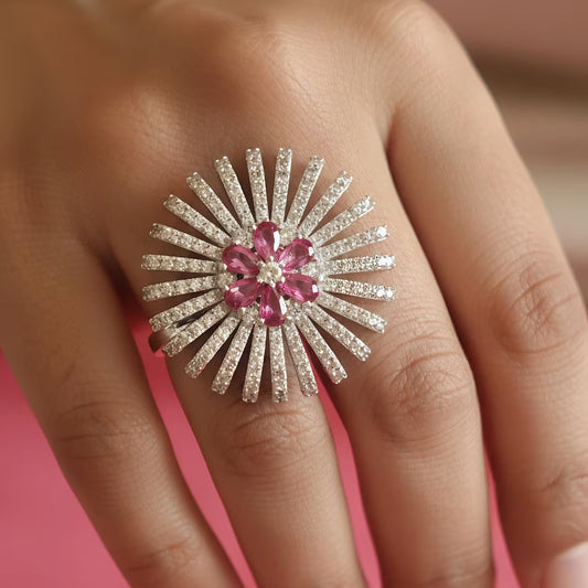 Pink floral silver statement ring with white zircon sunburst design