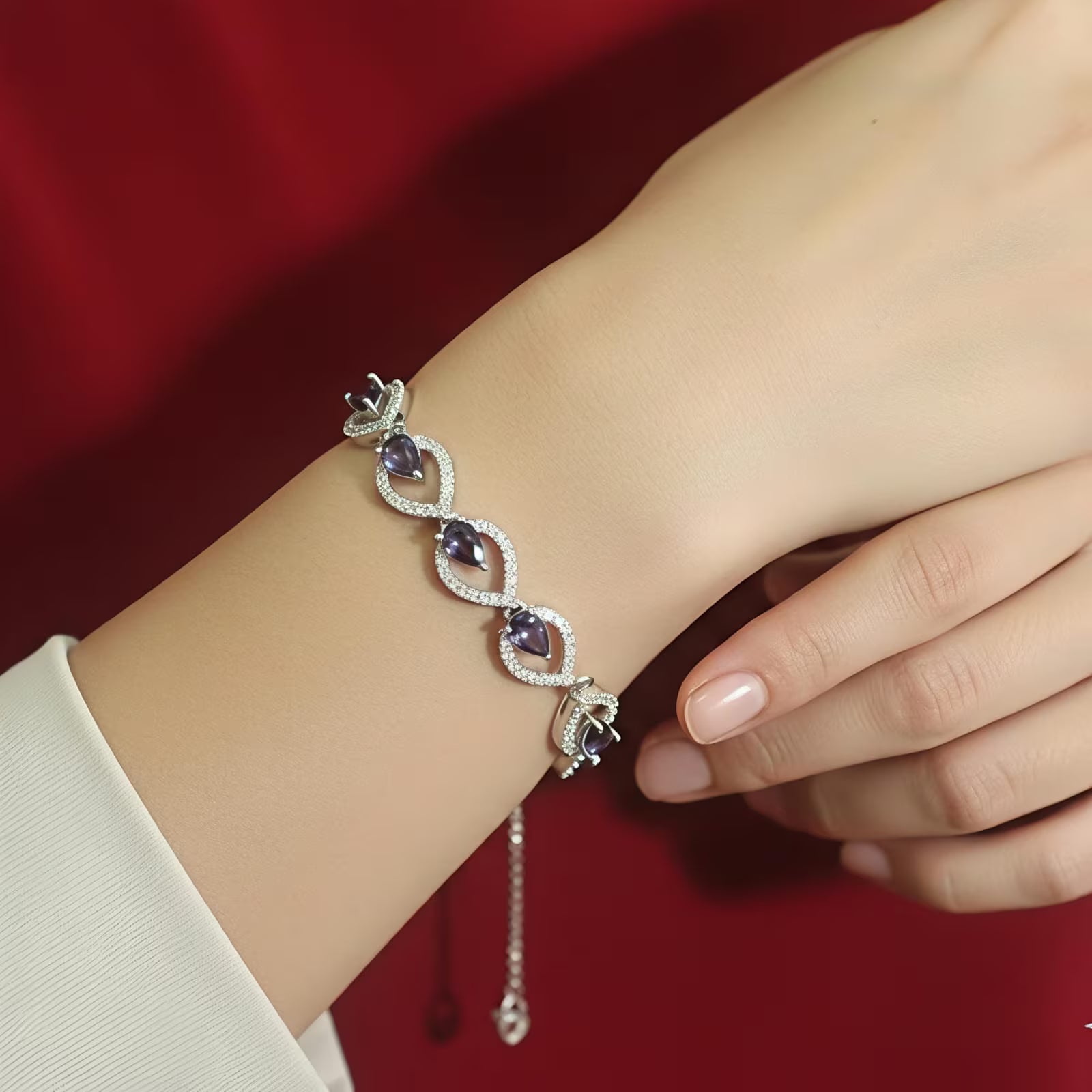 Silver Jewellery Purple Teardrop Leaf Vine Bracelet worn by woman

