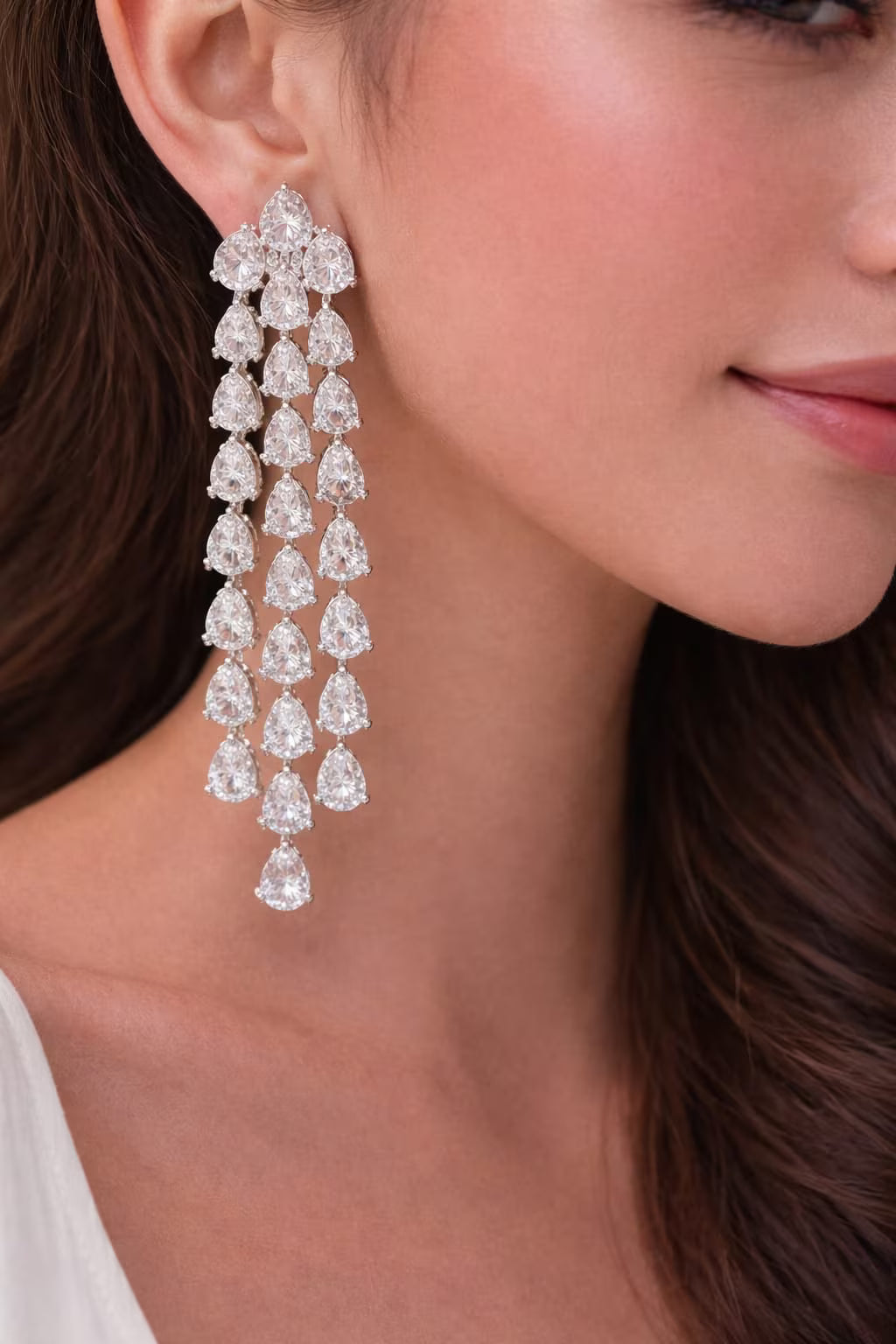 Silver Chandelier earrings worn by a woman