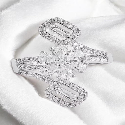 
Silver floral statement ring with pear-cut white zircon stones and rectangular halo design