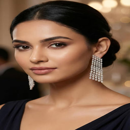 Silver long drop earrings with sparkling zircon stones by Karat India