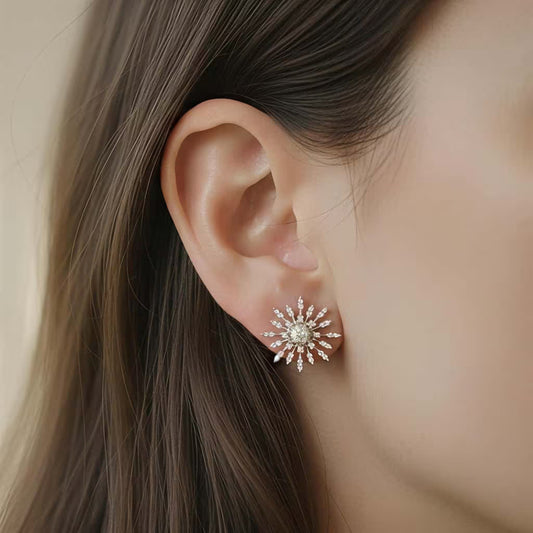 Starburst silver stud earrings with AAA zirconia stones by Karat India
