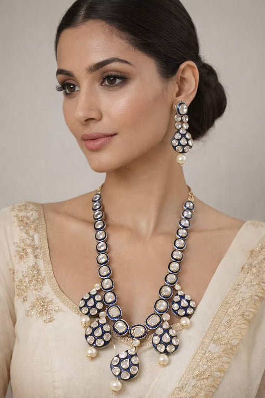 Close up view of traditional Jadau diamond polki necklace with handcrafted detailing.