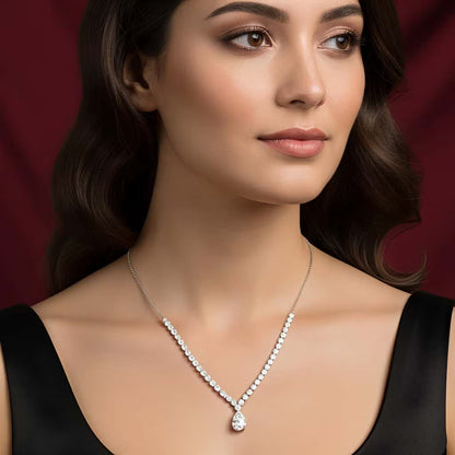 Elegant white diamond drop necklace with pear-shaped pendant by Karat India.