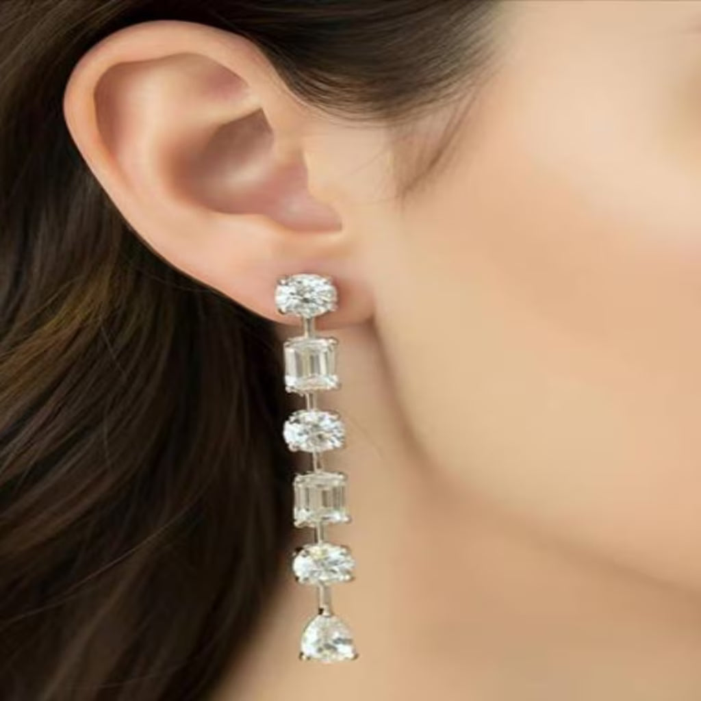 White floral cluster stud earrings with round flower design and silver finish